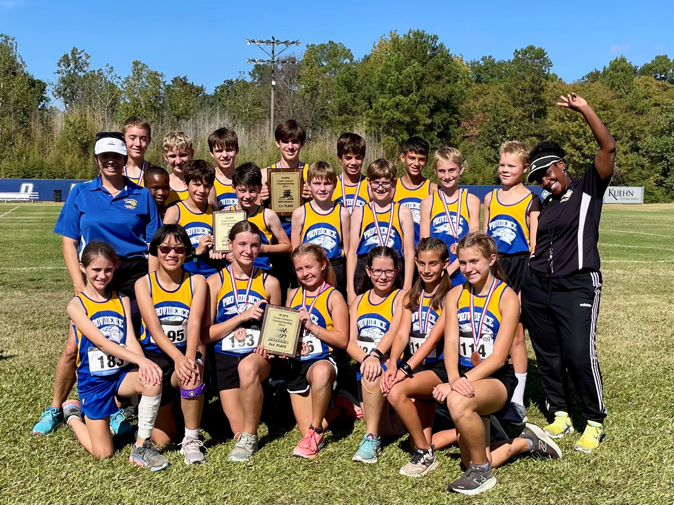 Providence Classical School Middle School Cross Country team poses as District Champions